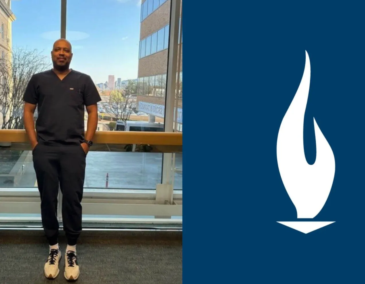 JR in navy blue scrubs standing proudly in the hallway of a hospital