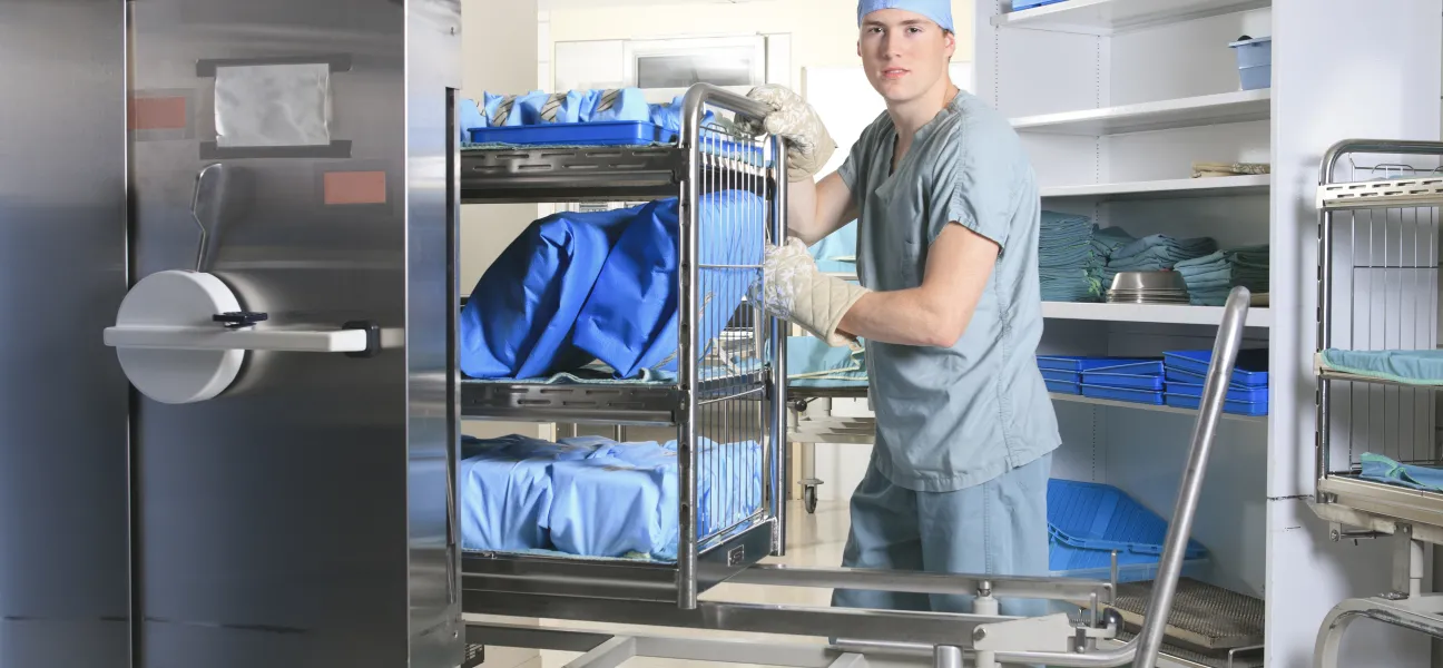 Sterile Processing Tech sanitizes gowns
