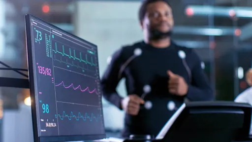 Treadmill cardio tests capturing vitals of man running.