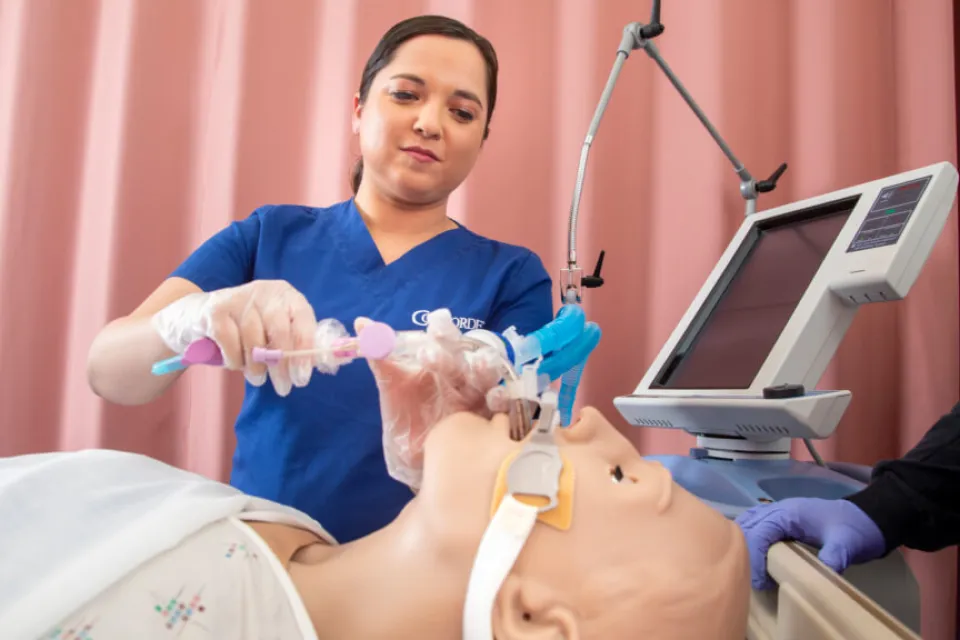 Concorde respiratory therapy student holding an endotracheal tube