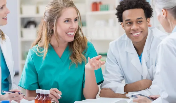 Young woman learns how to become a pharmacy tech