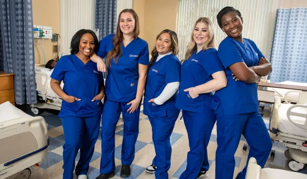 Types of nursing careers represented by nurses in scrubs