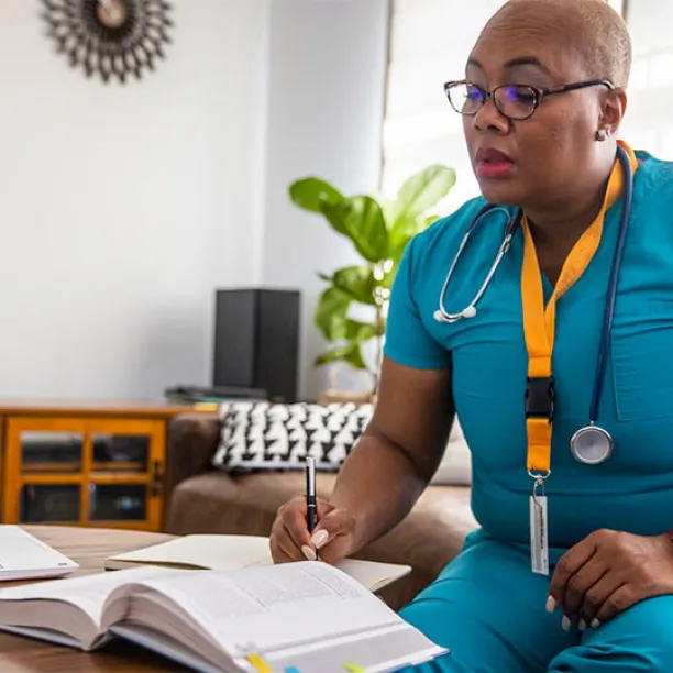 Nurse studying for NCLEX test requirements