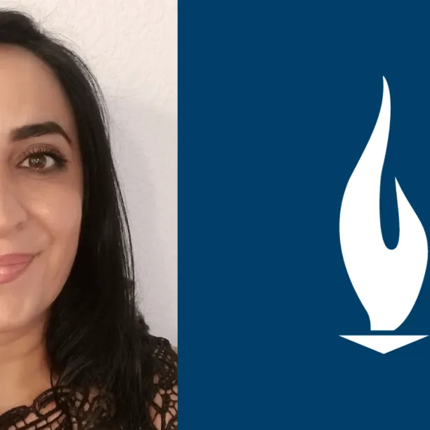 elham-danucalov-with-black-hair-smiles-for-camera