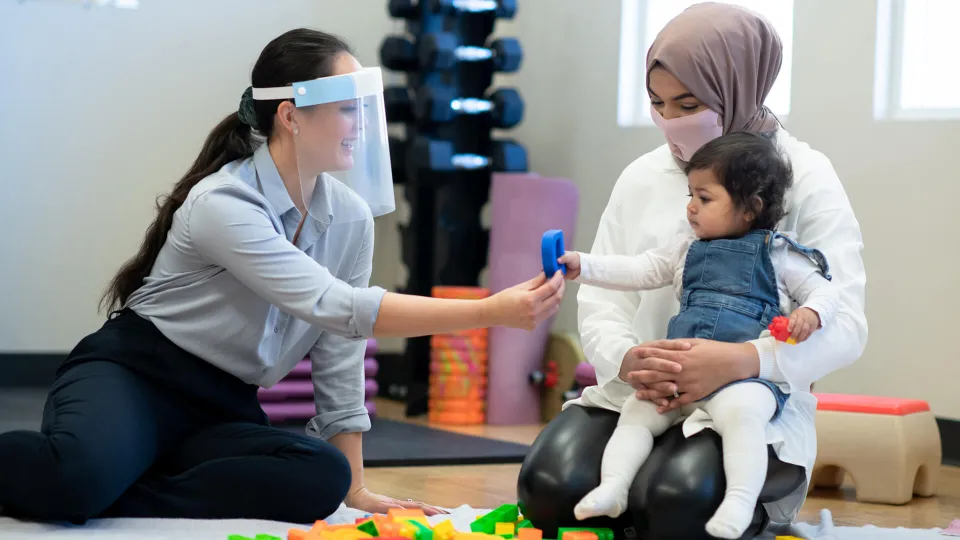 Occupational Therapy Assistant delivers culturally sensitive healthcare treatment to woman and her daughter.