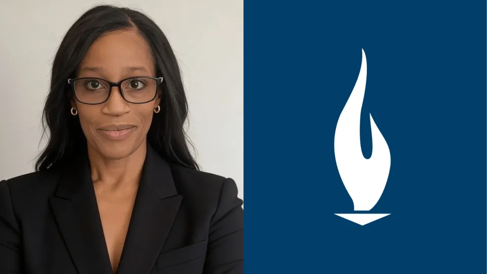Dr. Higgins Smiles for Camera in Headshot Style Photo