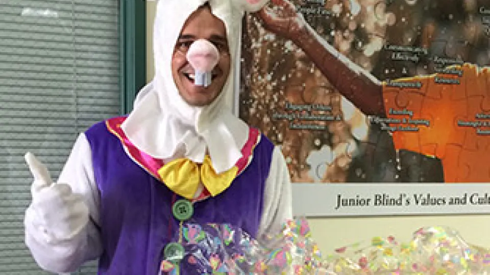 Student volunteers time as Easter bunny delivering Easter baskets. Student volunteers time as Easter bunny delivering Easter baskets.