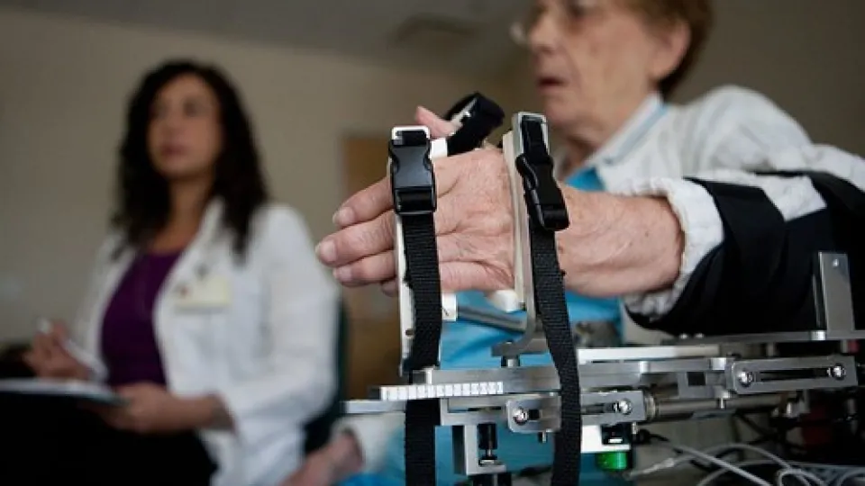 Occupational Therapist helping patient Occupational Therapist helping patient with hand