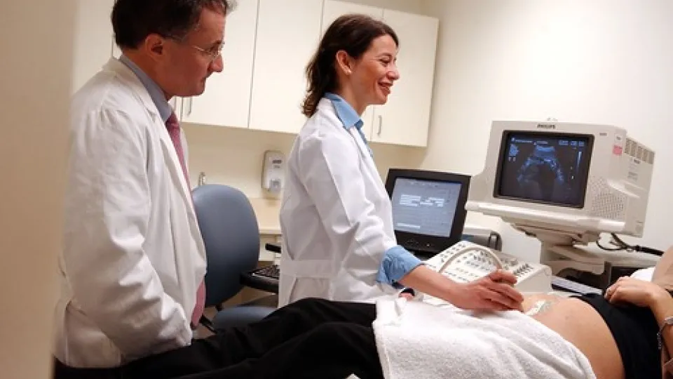 Sonographer looking at monitor Sonographer looking at monitor