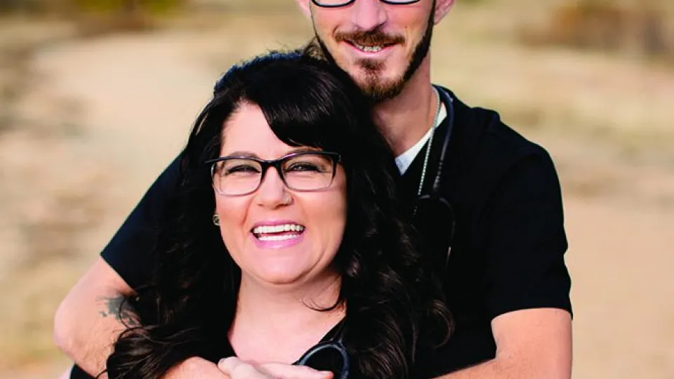 Stubblefield_Article_Photo Stubblefields posing in field