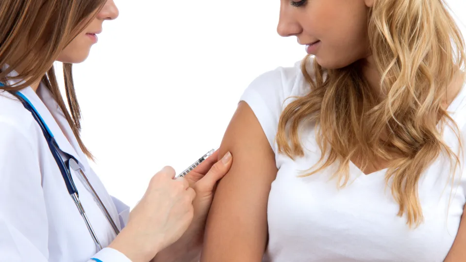 Doctor making diabetes patient insulin flu shot health care awareness