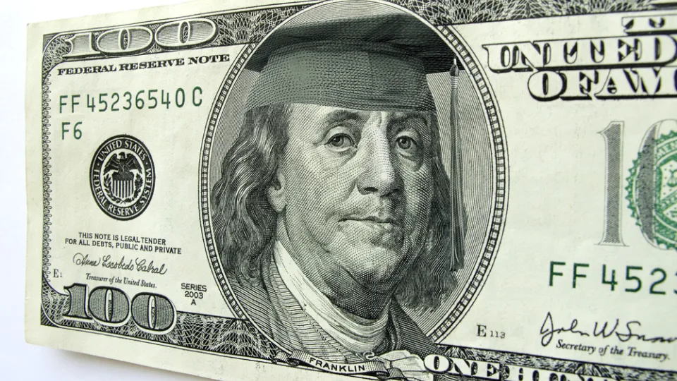 Ben Franklin Wearing Graduation Cap on One Hundred Dollar Bill health care education