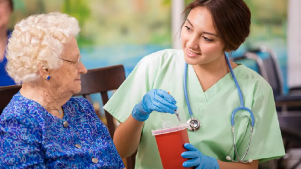 nurse disposing syringes nurse disposing syringes