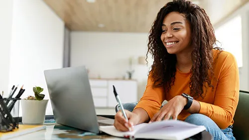 Young adult studying to pass NCLEX exam